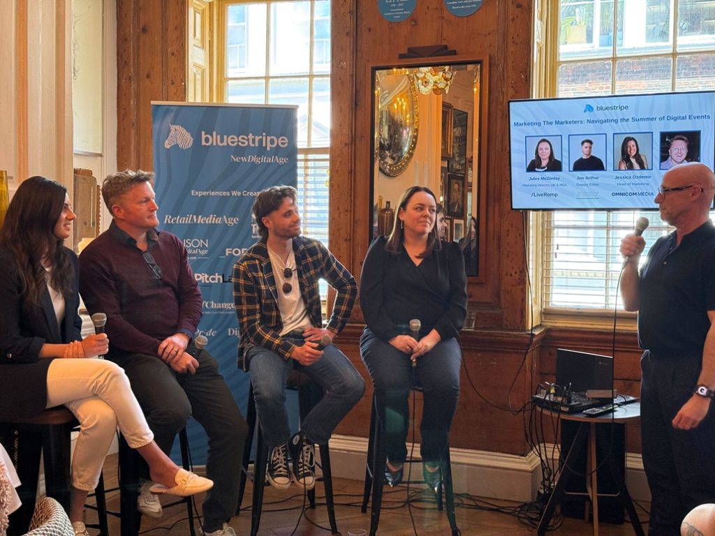 At Bluestripe Group's Marketing the Marketers, Jules McGinlay, Joe Arthur, Jessica Ozdemir, and Dominic Tillson speak on a panel moderated by Andy Oakes.